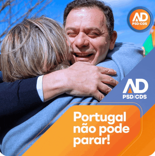 a man is hugging a woman with the words portugal não pode parar