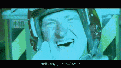 a man wearing a helmet is making a funny face and saying hello boys i 'm back !!!
