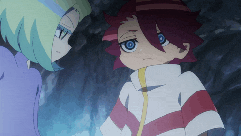a boy with red hair and blue eyes stands next to a girl in a purple shirt