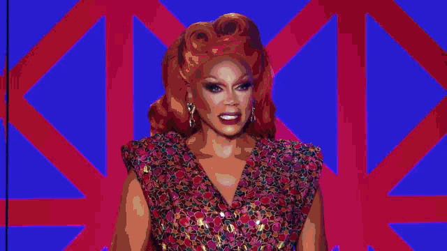 a woman in a gold dress is dancing on a checkerboard floor