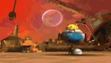 a cartoon character is standing on a globe in front of a bubble .