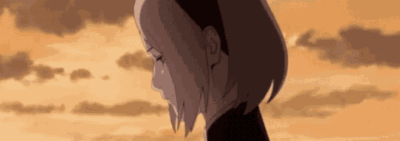 a close up of a woman 's face with her eyes closed against a cloudy sky .