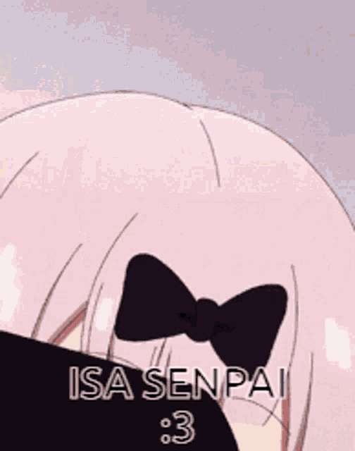 a close up of a girl with a bow in her hair and the words isa senpai : 3