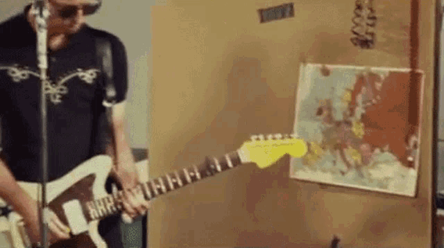 Playing Guitar Noel Gallagher GIF - Playing Guitar Noel Gallagher Noel Gallaghers High Flying Birds GIFs