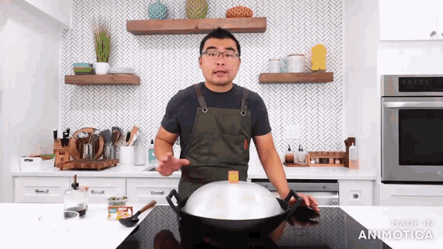 a man cooking in a kitchen with the words made in animatica visible