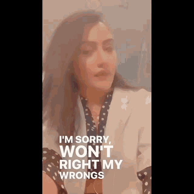a woman in a white jacket says i 'm sorry won 't right my wrongs .