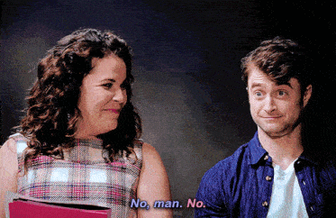 a man and a woman are standing next to each other and the woman is saying no man no