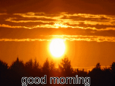 a picture of a sunset with the words good morning on the bottom