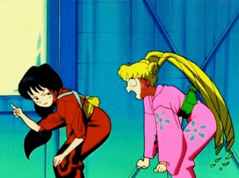 two anime girls are standing next to each other one is pointing