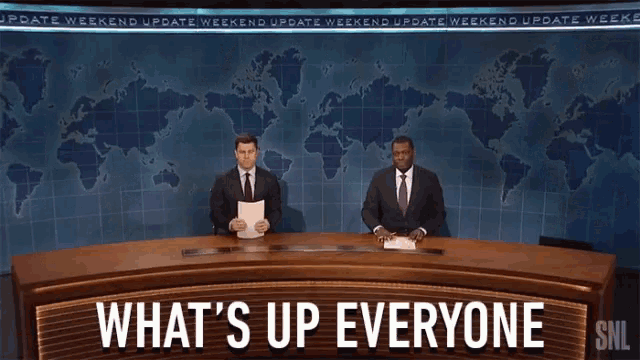 a snl newscast with two anchors and the words what 's up everyone on the screen
