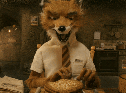 a fox wearing a white shirt and tie is eating pancakes