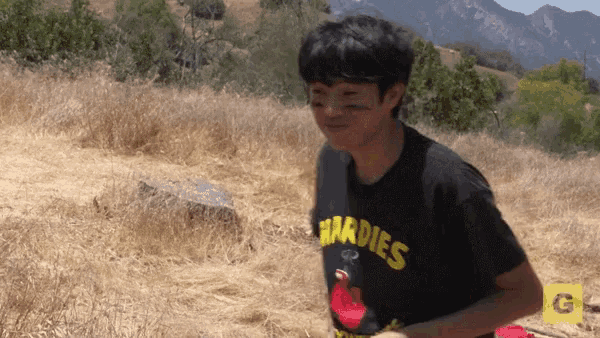 a young man wearing a shirt that says hardies