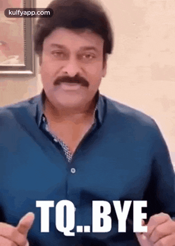 a man with a mustache and a blue shirt is giving a thumbs up and saying `` to bye '' .