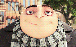 a close up of a cartoon character wearing a scarf and smiling