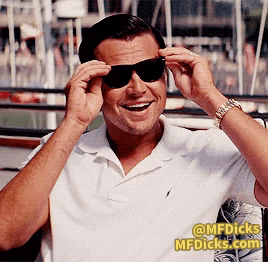 a man wearing sunglasses and a white shirt with a watermark that says mfdicks.com