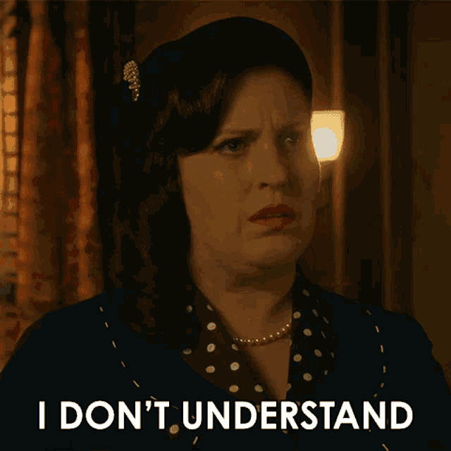 a woman wearing a hat and a polka dot dress says i don 't understand