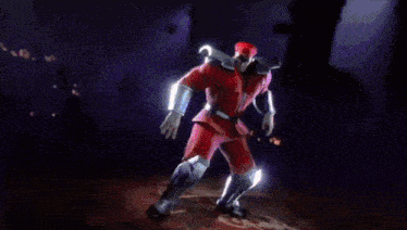 a cartoon character in a red suit is holding a sword in a dark room .
