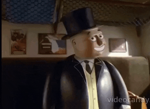 a cartoon character wearing a top hat and a suit and tie is standing in a room .
