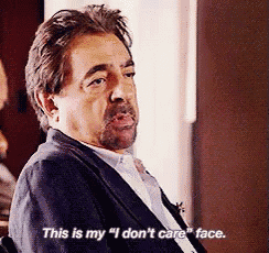 a man with a beard is saying this is my " i don 't care face "