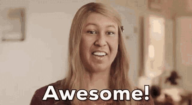 a woman is making a funny face and saying `` awesome ! ''