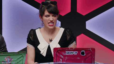 a woman is sitting in front of a laptop that says skiff it on it