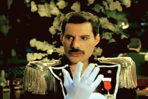 Queen Freddie Mercury GIF - Queen Freddie Mercury Gloves GIFs