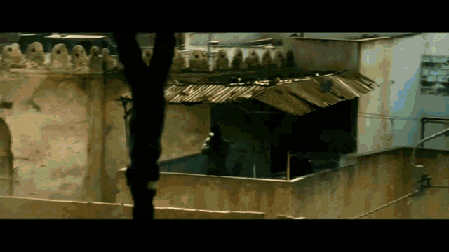 a very old building with a roof that has a few holes in it