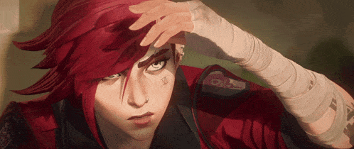 a woman with red hair has a tattoo on her face that says ix