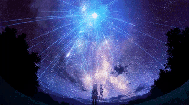 two people looking up at a starry sky