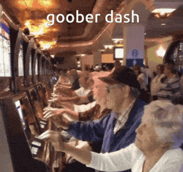 a group of people playing a slot machine with the words goober dash written above them
