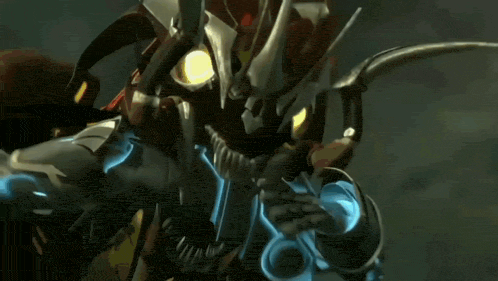 a close up of a robot with a yellow light on it