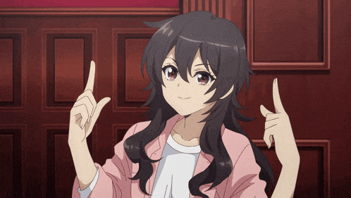 a girl in a pink jacket is pointing her fingers up