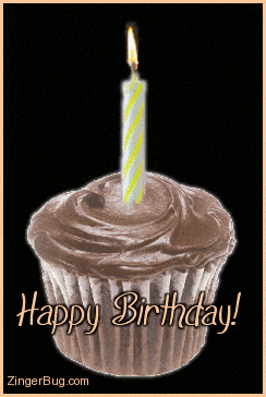 a cupcake with a lit candle and the words happy birthday on the bottom