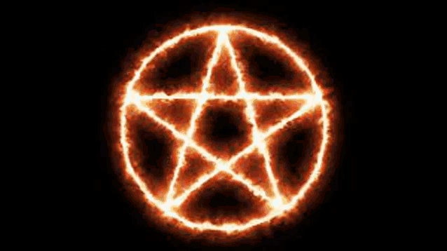 a pentagram is surrounded by flames on a black background and is glowing .