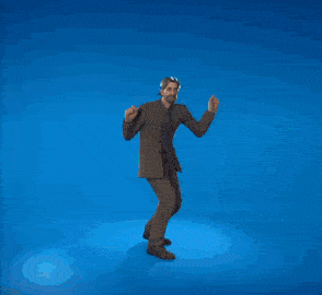 a man in a suit is dancing in front of a blue light