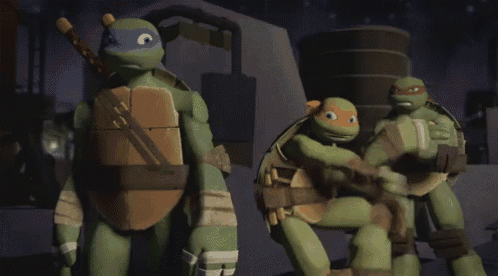a group of teenage mutant ninja turtles standing together