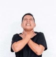 a man in a black shirt is holding his throat .