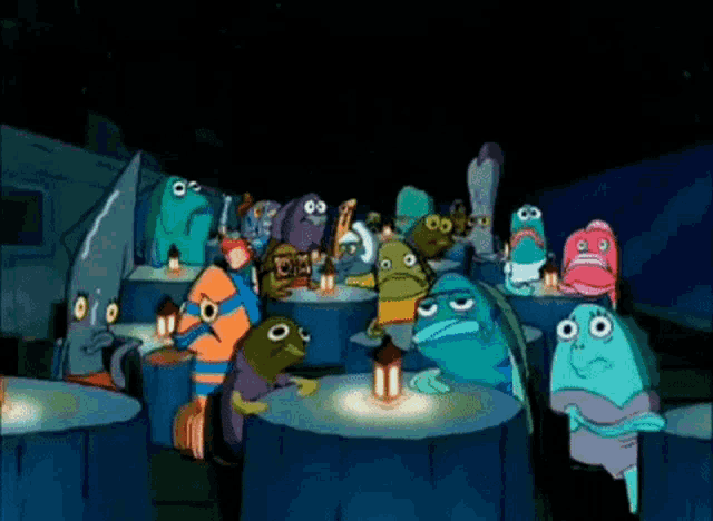 a group of cartoon characters are sitting around a table with a lantern .