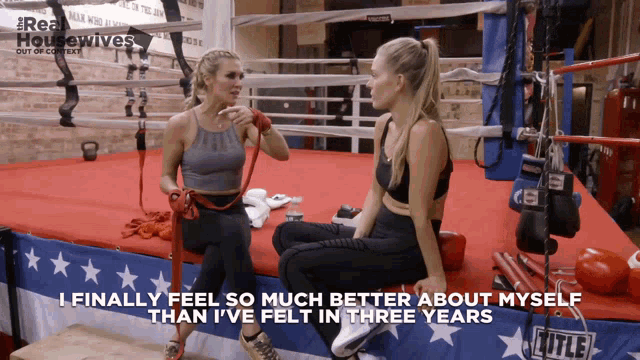 two women are sitting in a boxing ring and one says i finally feel so much better