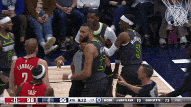 a basketball player with the number 3 on their back
