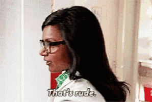 a woman wearing glasses and a white coat is saying `` that 's rude '' .