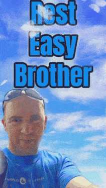 a man in a blue shirt takes a selfie with the words rest easy brother above him