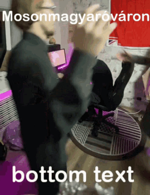 a man standing in front of a computer with the words bottom text written on the bottom
