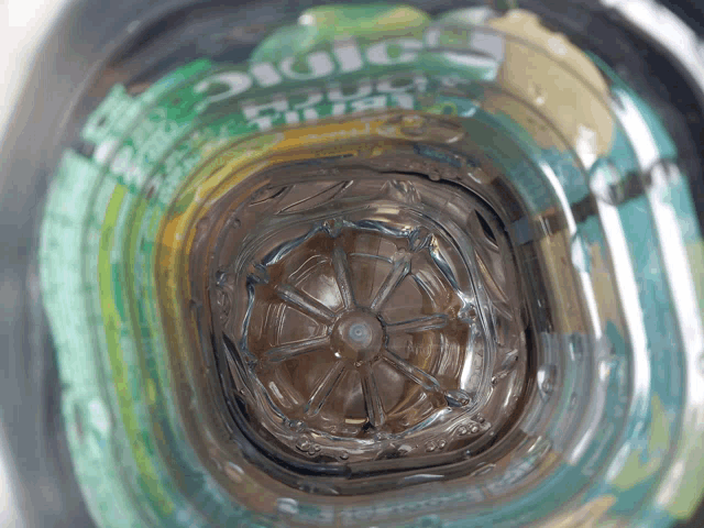 the inside of a plastic bottle with a label that says juice