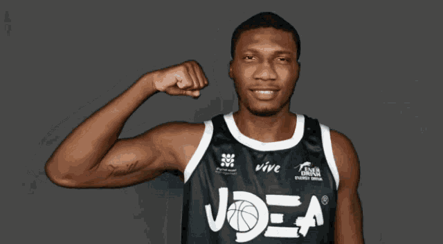 a basketball player wearing a jersey that says vive
