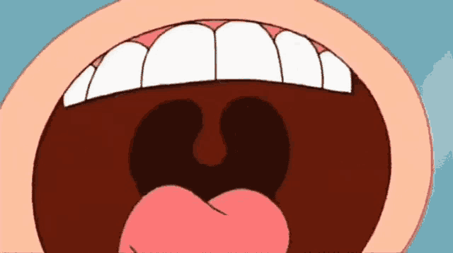 a close up of a person 's mouth with a pink tongue sticking out