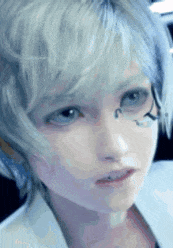 a close up of a person 's face with a blue background