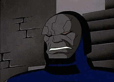 a cartoon of a man with red eyes and a black cape .