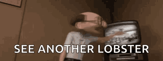 a man with glasses and a mustache is standing in front of a television with the words see another lobster above him