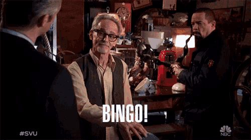 a man in a vest says bingo in a scene from a tv show
